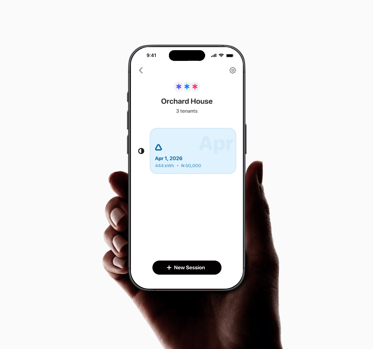 A hand holding a phone with Nira open, entering each tenant's meter reading for a recharge session